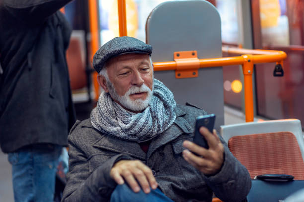 istock Mature Man Riding In A Bus 1130715991