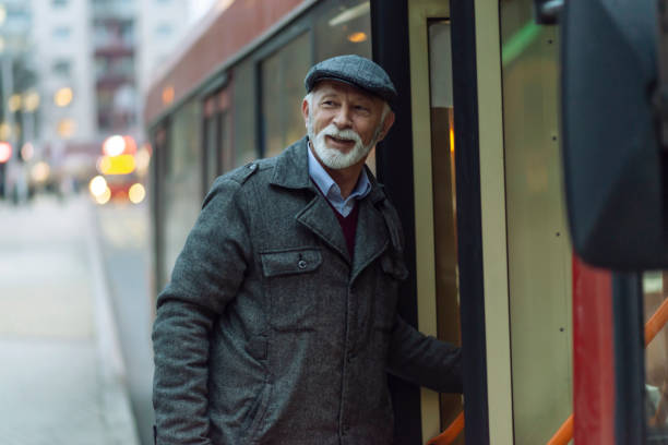 istock Mature Man Entering a Bus 1130716073