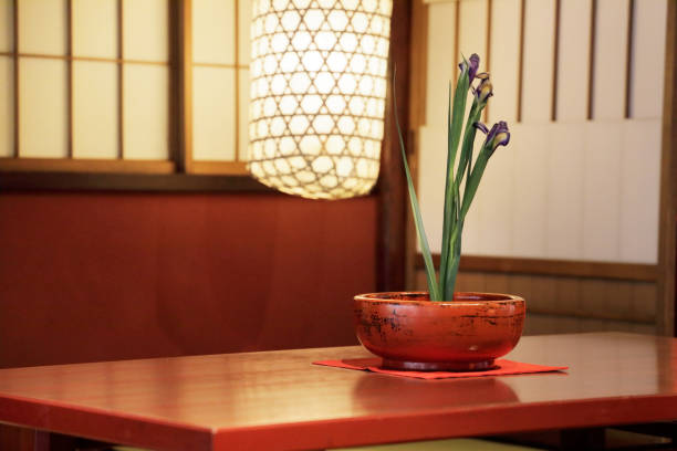 istock Purple flowers placed on a Japanese style desk 1130717411