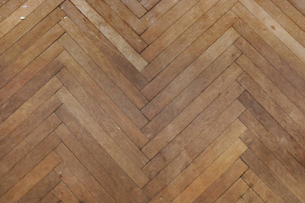 istock texture of old wooden parquet 1130717566