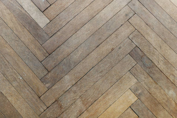istock texture of old wooden parquet 1130717577