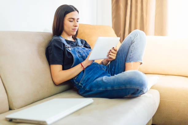 istock Young woman working casually from home 1130722258