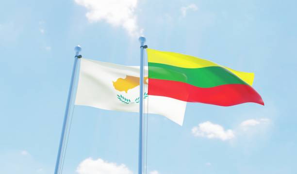 istock Lithuania and Cyprus, two flags waving against blue sky 1130722578
