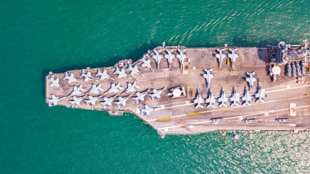 istock Top View Aircraft Carrier are sailing in the ocean 1130726431