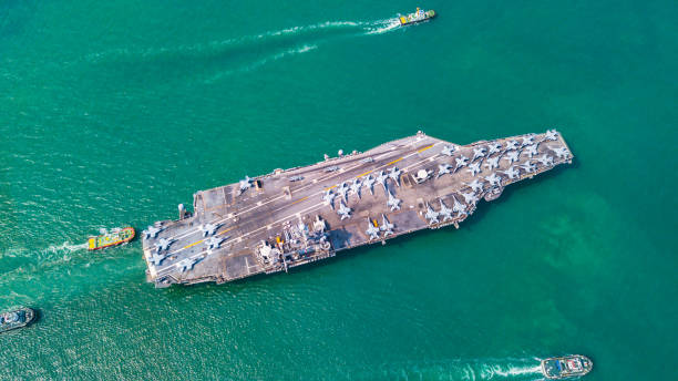 istock Top View Aircraft Carrier are sailing in the ocean 1130726437