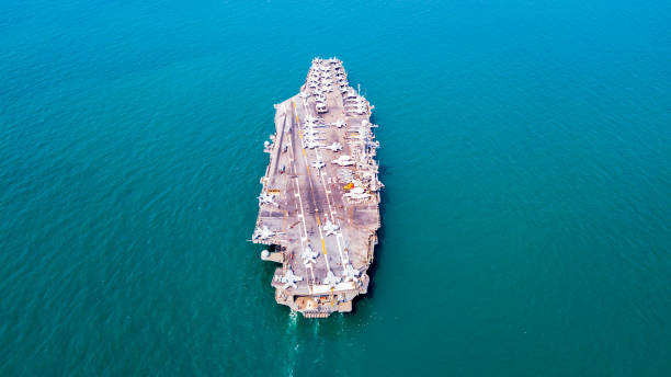 istock Top View Aircraft Carrier are sailing in the ocean 1130726438