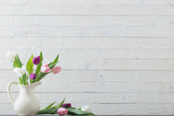 istock spring flowers in white vase 1130727714