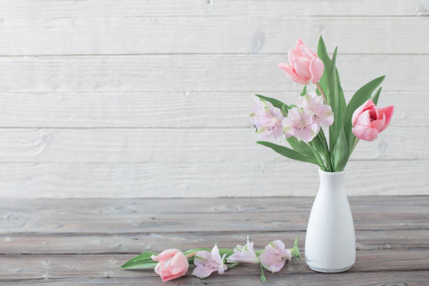 istock spring flowers in white vase 1130727720