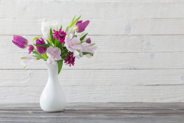 istock spring flowers in white vase 1130727726