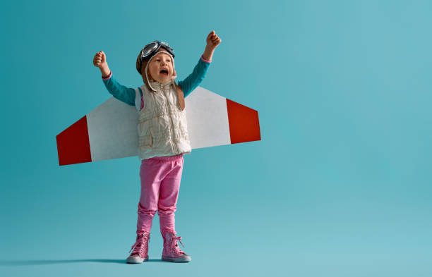 istock girl in an astronaut costume 1130729913