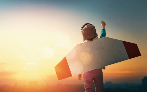 istock girl in an astronaut costume 1130729920