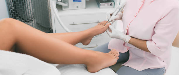 chiropodist service . chiropodist care about clients foot. - podiatrist podiatry pedicure chiropodist imagens e fotografias de stock