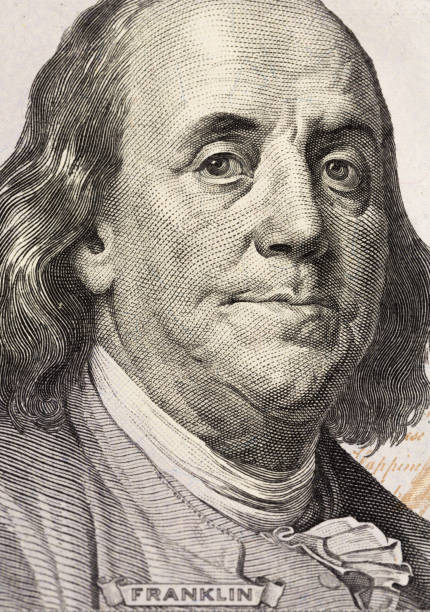 istock Benjamin Franklin's look on a hundred dollar bill. Benjamin Franklin portrait macro usa dollar banknote or bill 1130731680