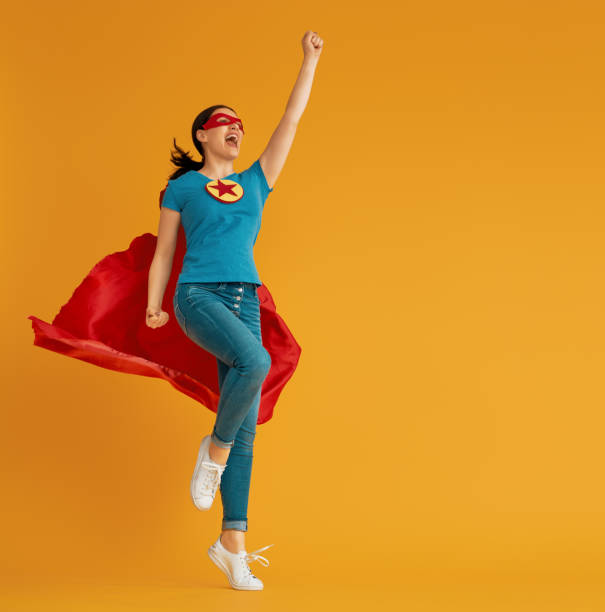 istock woman in superhero costume 1130731695
