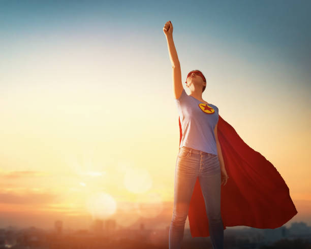 istock woman in superhero costume 1130731697