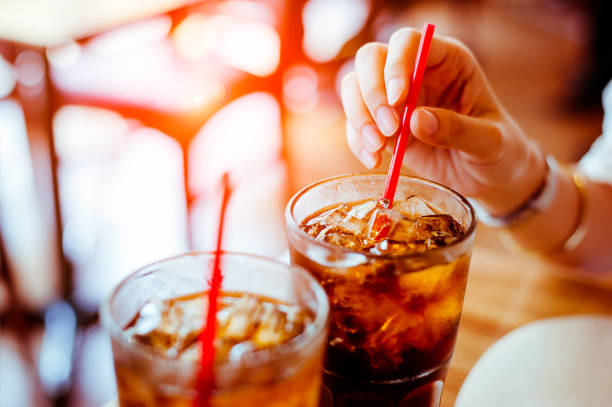 istock Two glass soft drink with ice in restaurant background 1130734093