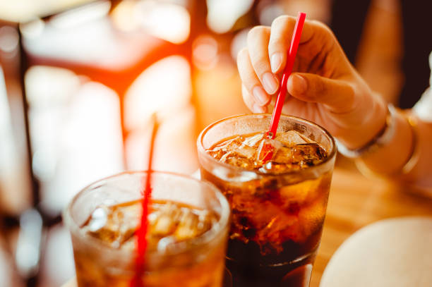 istock Two glass soft drink with ice in restaurant background 1130734144