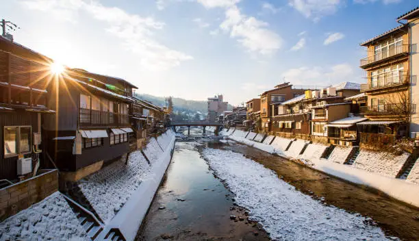 Sunrise morning at Takayama city and stream water, Japan