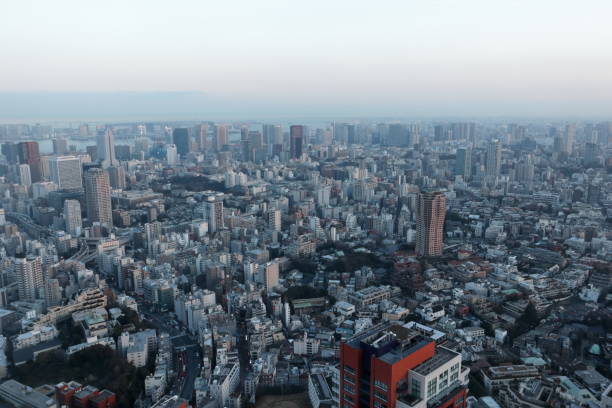istock Cloudy sky and city landscape 1130737642