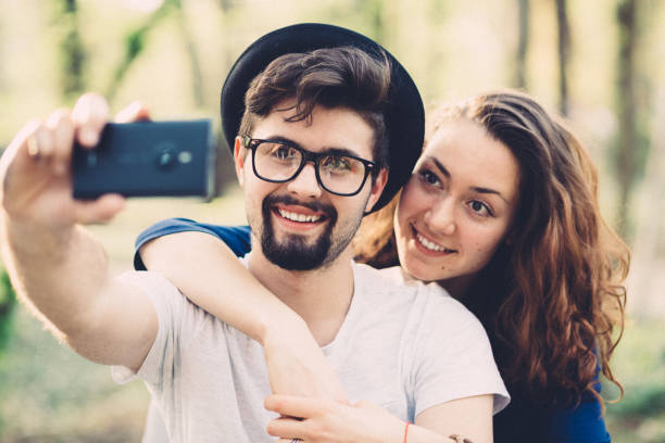 istock Young couple taking selfie on Valentine's day 1130738028