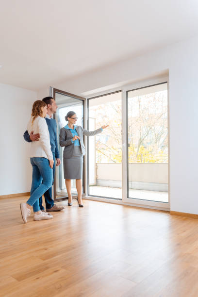 istock Young couple getting tour through apartment they consider renting 1130738998
