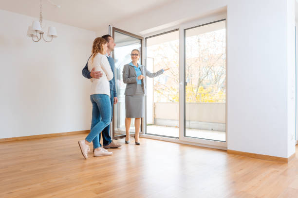 istock Young couple getting tour through apartment they consider renting 1130739259
