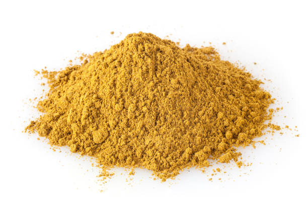 istock Heap of curry powder isolated on white background 1130741443