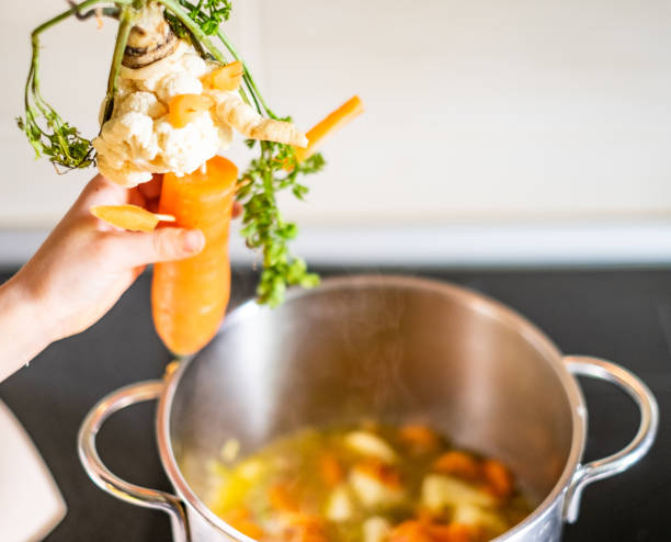 istock Close up doll of vegetables looking at soup 1130742768