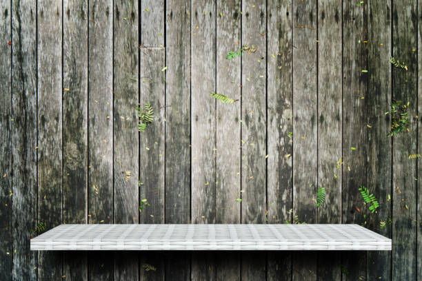 istock Empty white shelf on wooden background for product display 1130746994