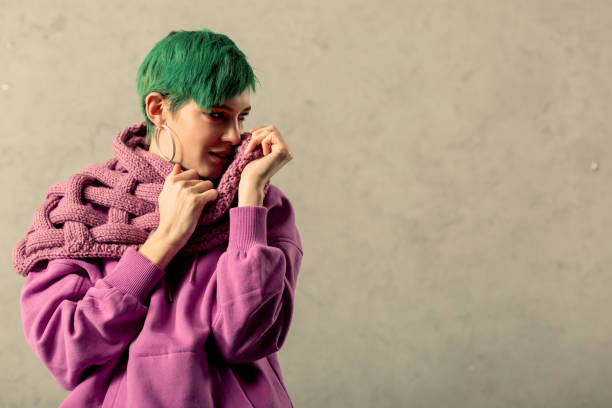 istock Nice pleasant woman wearing a knitted scarf 1130748327
