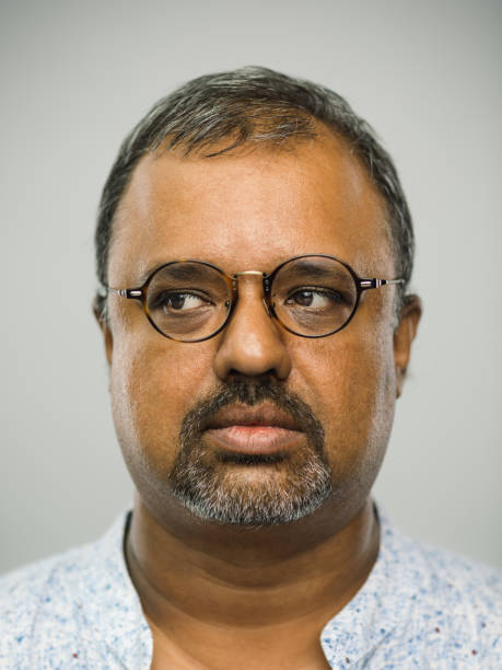 istock Real indian man with blank expression looking to the side 1130750458