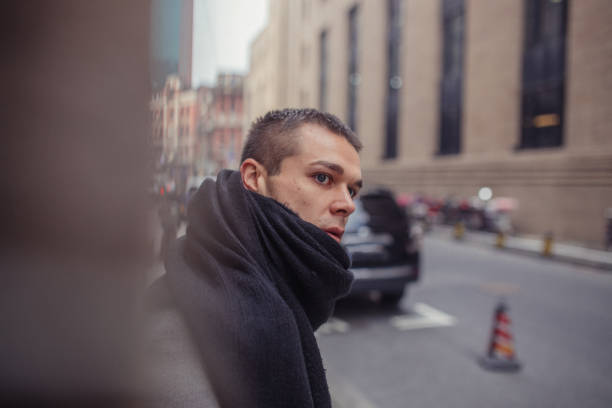 istock Stylish guy with black scarf 1130750746
