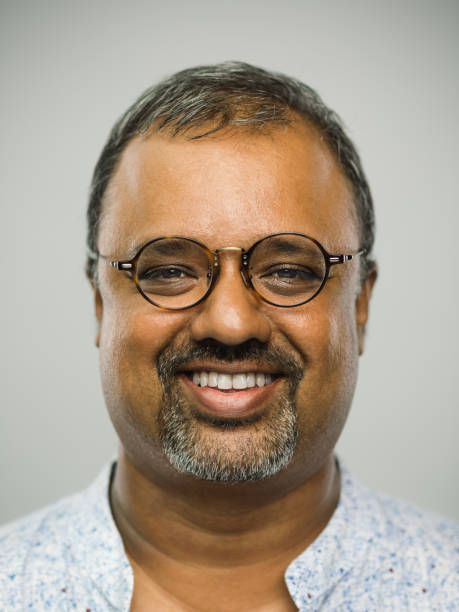 istock Real indian mature man with happy expression and toothy smile 1130752230