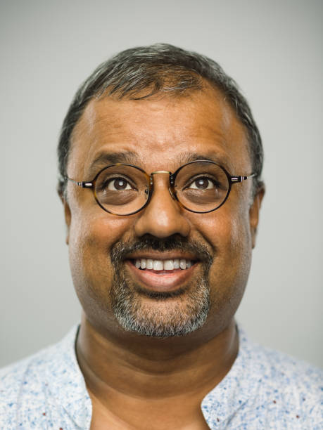 istock Real indian mature man with excited expression looking up 1130752605