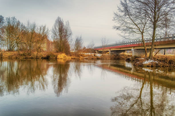istock Winter sunset on the Widawka river in central Poland 1130752611