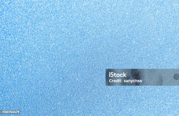 Shiny light blue glitter background, texture for superior elegant