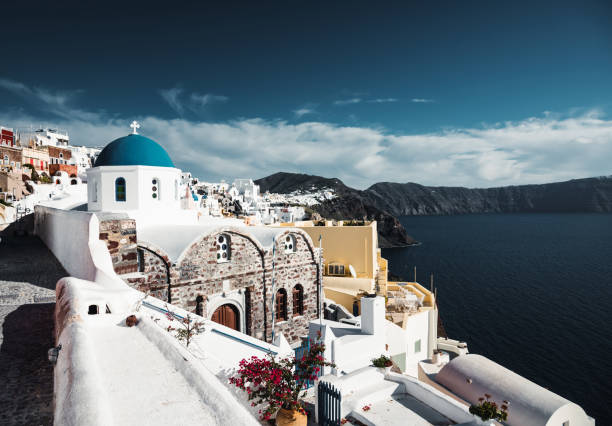Blue church of Oia village at Santorini island. Greece