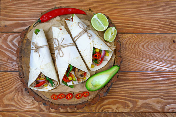 istock three mexican pork carnitas tacos flat lay composition on a wooden background 1130757332