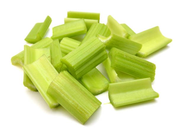 istock heap of sliced celery, isolated on white background 1130758811