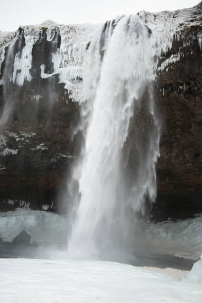 istock Seljalandsfoss waterfall in Iceland during winter covered in ice 1130766889