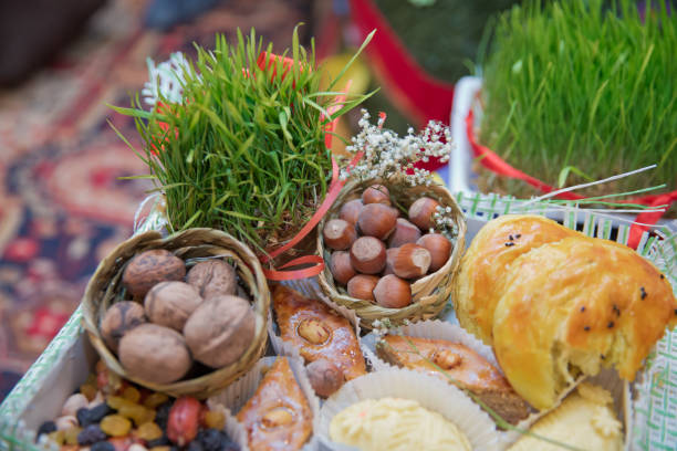 istock Hazelnuts, filbert in burlap sack on wooden backdrop. heap or stack of hazelnuts. Hazelnut background, healty food . Semen is the attribute of Noruz holiday . 1130766899
