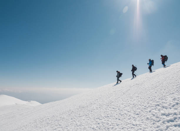 istock Group of climbers are walking in the mountain peak 1130767455