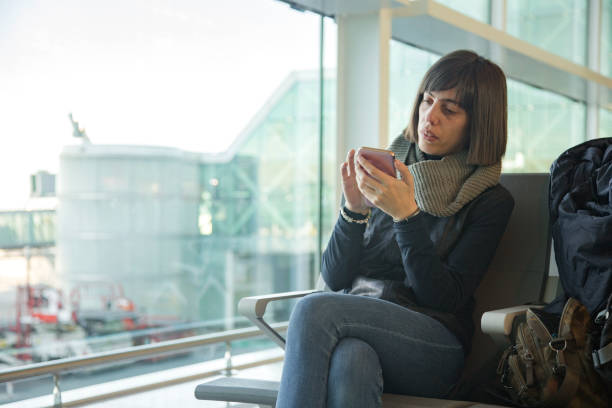 istock Woman in Airport 1130767599