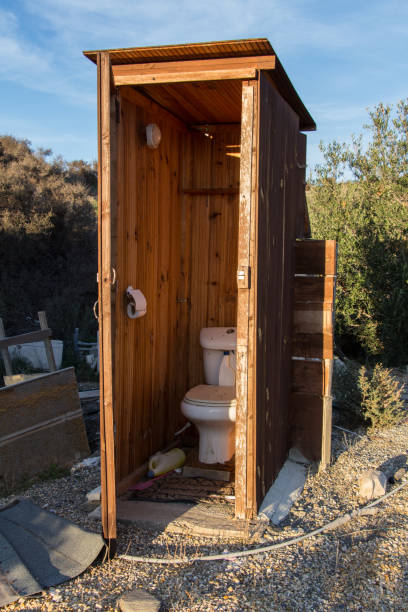 istock rustic wooden toilet 1130769981