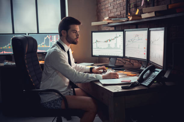 istock Concentrated businessman or stock broker over forex chart projection 1130771057