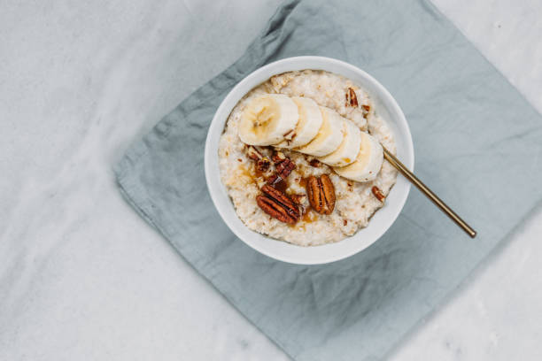 istock Oatmeal with berries and nuts. Concept healthy breakfast. 1130772275