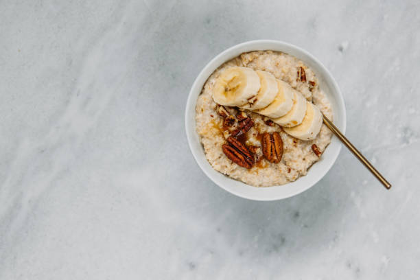 istock Oatmeal with berries and nuts. Concept healthy breakfast. 1130772322