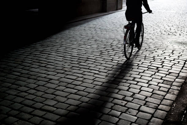 Madrid, Spain - May 15, 2020: A working Uber Eats rider walks in an empty street during the lockdown decreed in Spain by COVID-19 (SARS-CoV-2)