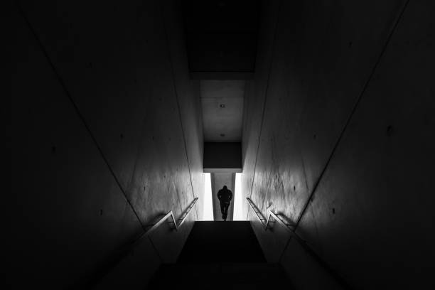 istock A person goes up a staircase 1130774398