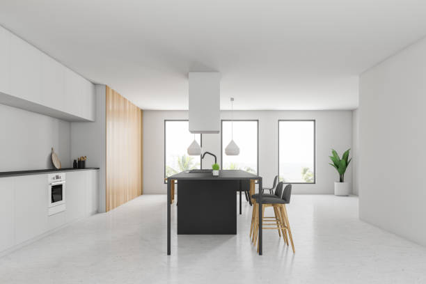 istock Side view of white kitchen with bar 1130782501